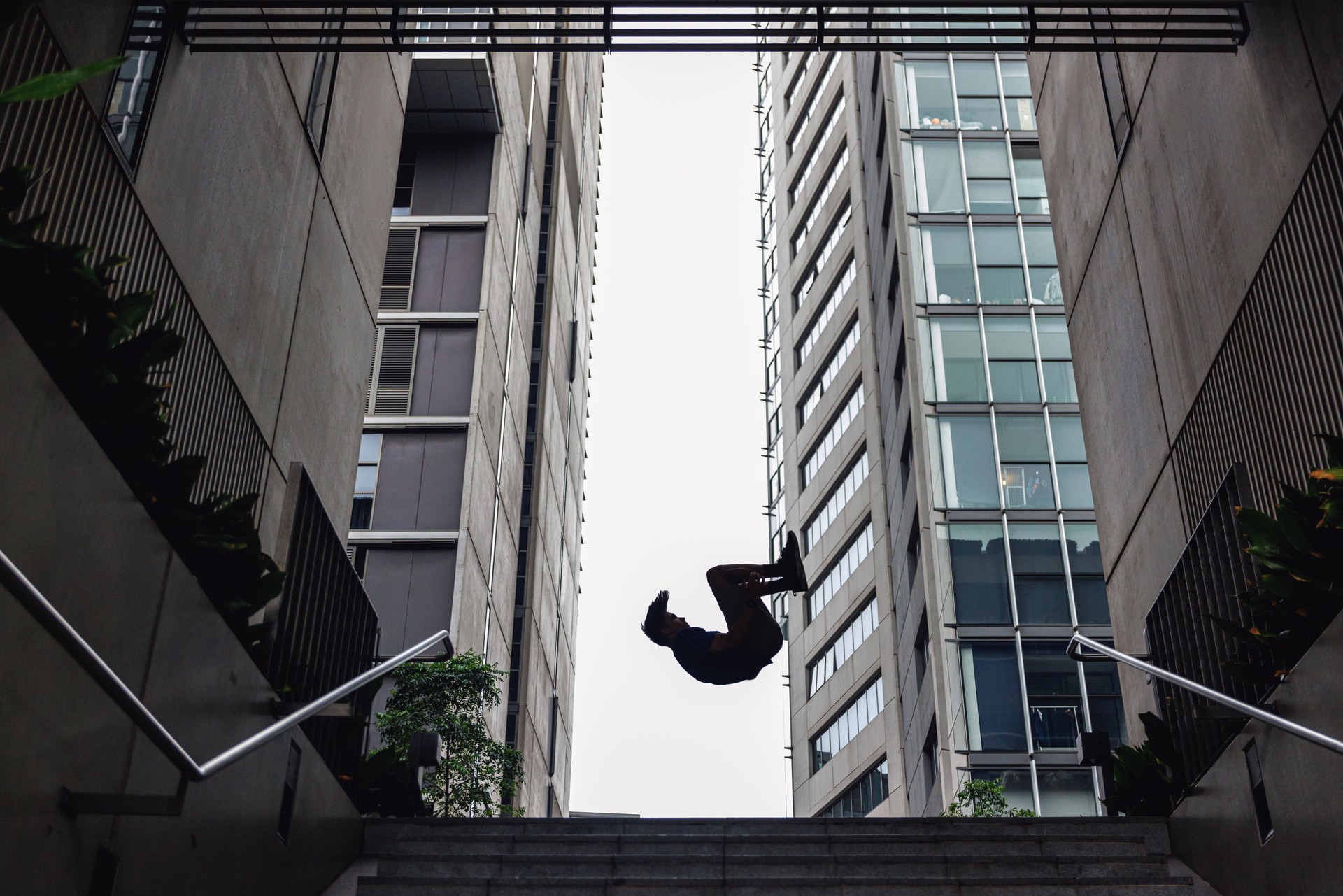 Teenage parkour athletes in urban location